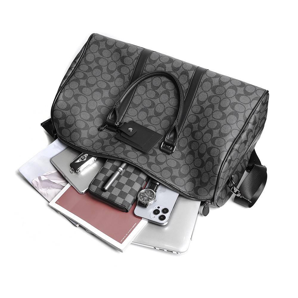 WhatsApp Image 2025-12-14 at 1.36.10 PM (2) Coach Duffle Bag - Image 1